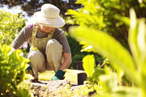 Gardener reviewing a transparent quote for a Peckham garden job